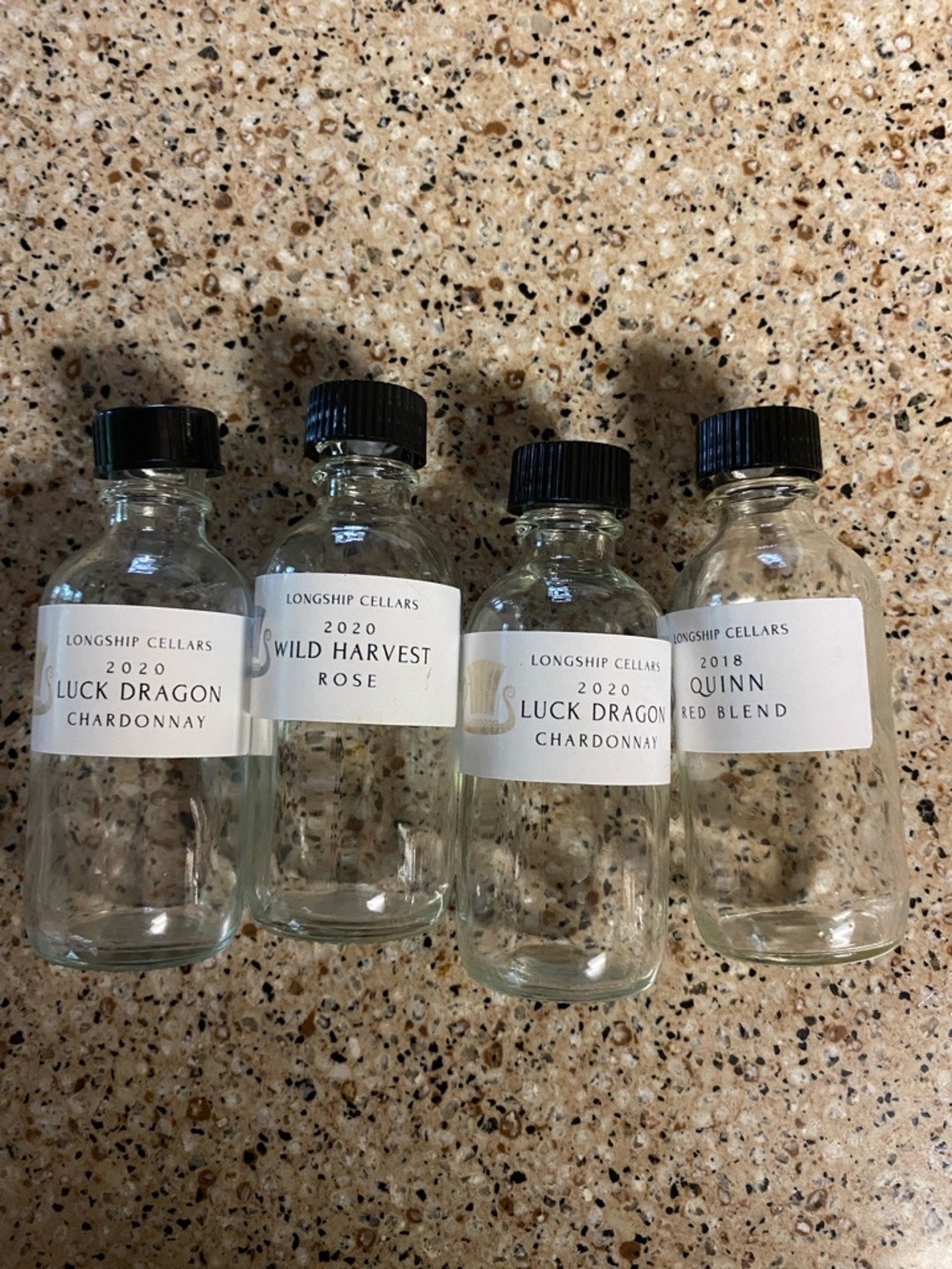 Longship Cellars Mini Bottles / Vases - Clear Glass with Black Caps